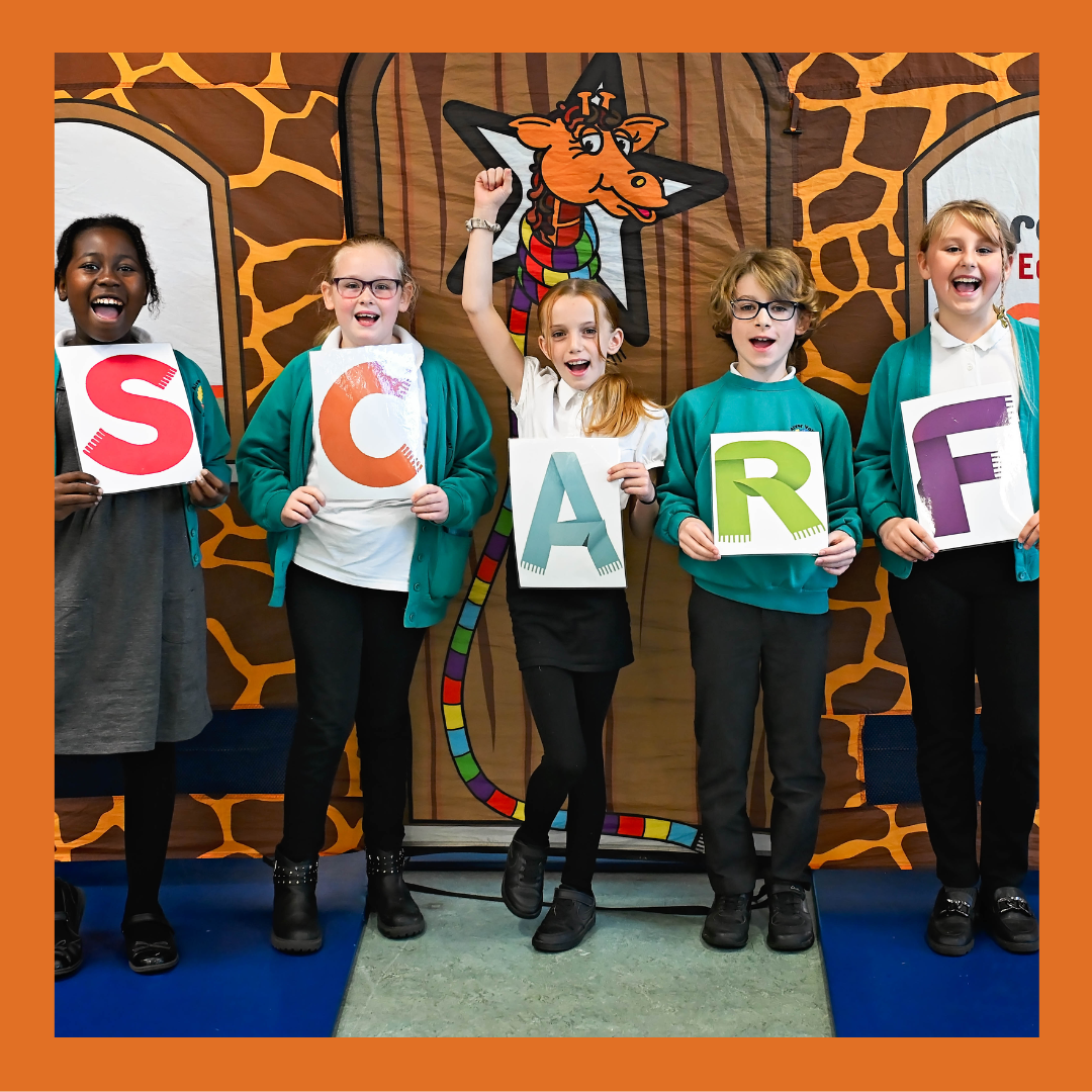 Children holding up SCARF letters